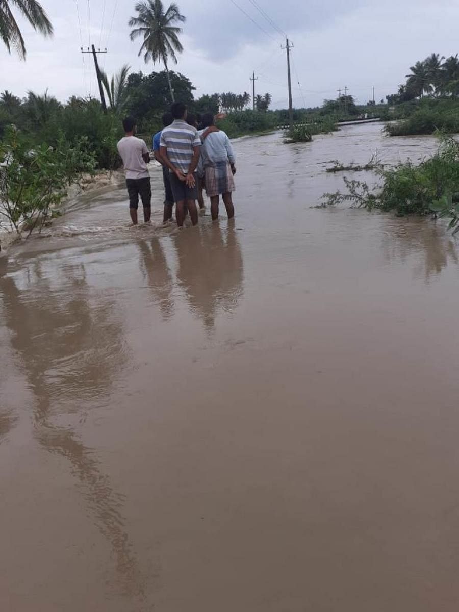 Flood inundates bridges, submerges roads