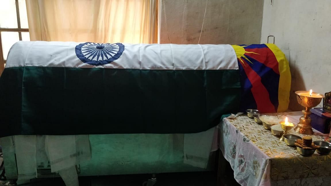 Niyma's body draped in the tricolour and the Tibetan snow-leopard flag. Credit: Special arrangement