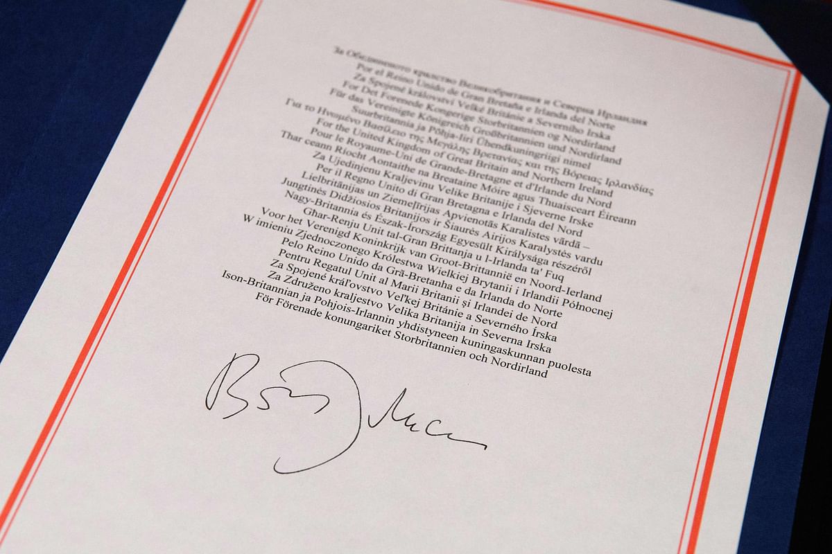 A picture shows the signature of Britain's Prime Minister Boris Johnson on the Trade and Cooperation Agreement between the UK and the EU, the Brexit trade deal, at 10 Downing Street in central London on December 30, 2020. Credit: AFP Photo