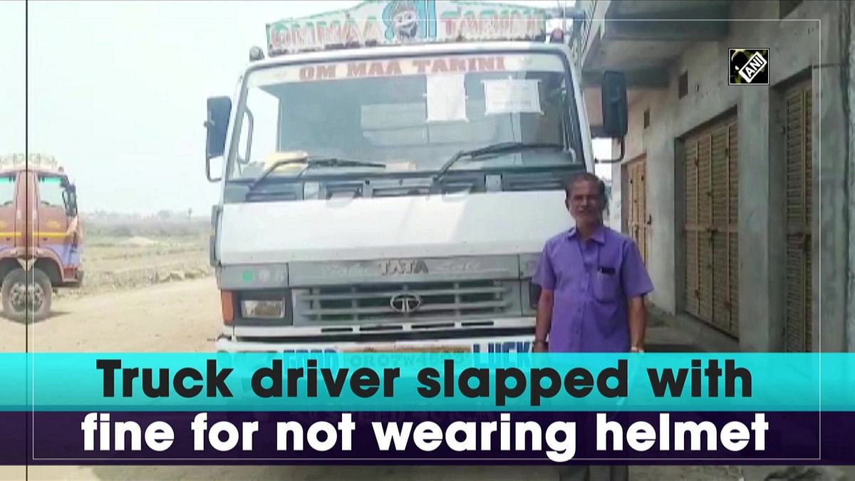 This truck driver was fined for not wearing a helmet