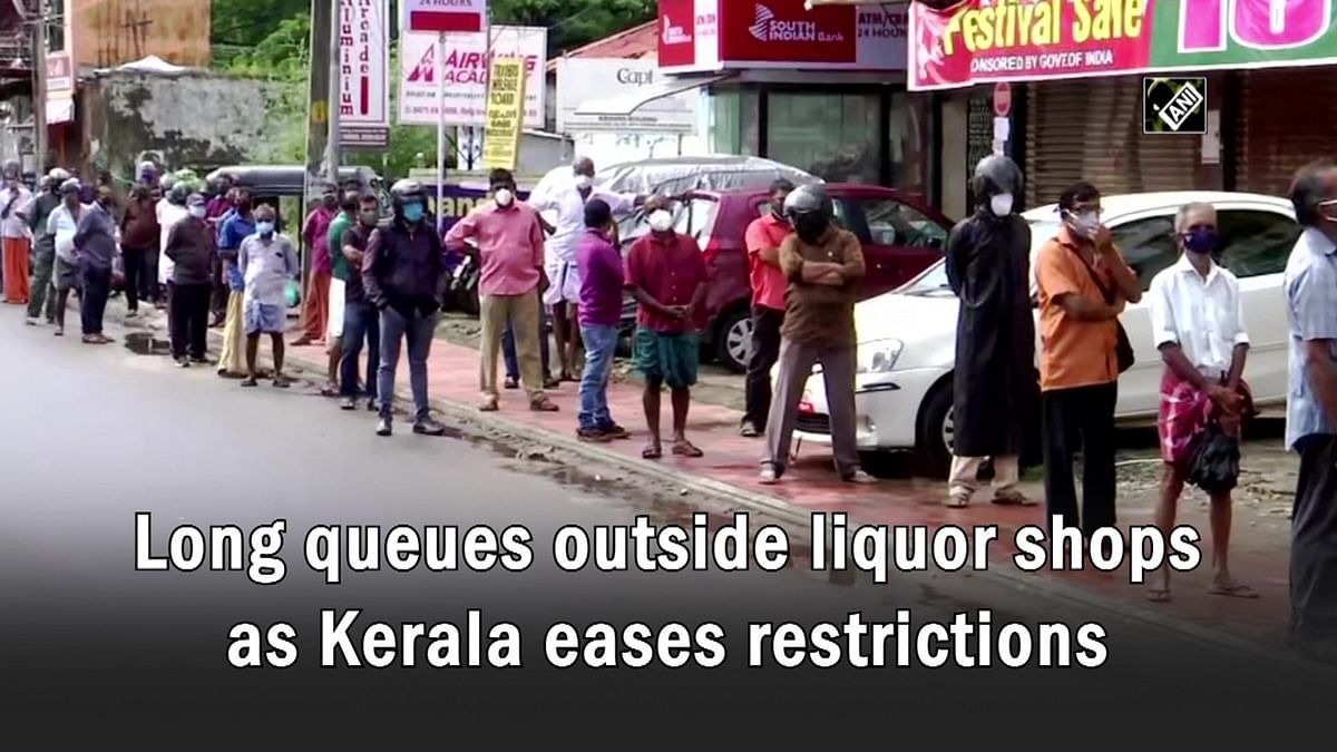 Long queues outside liquor shops as Kerala eases Covid-19 restrictions