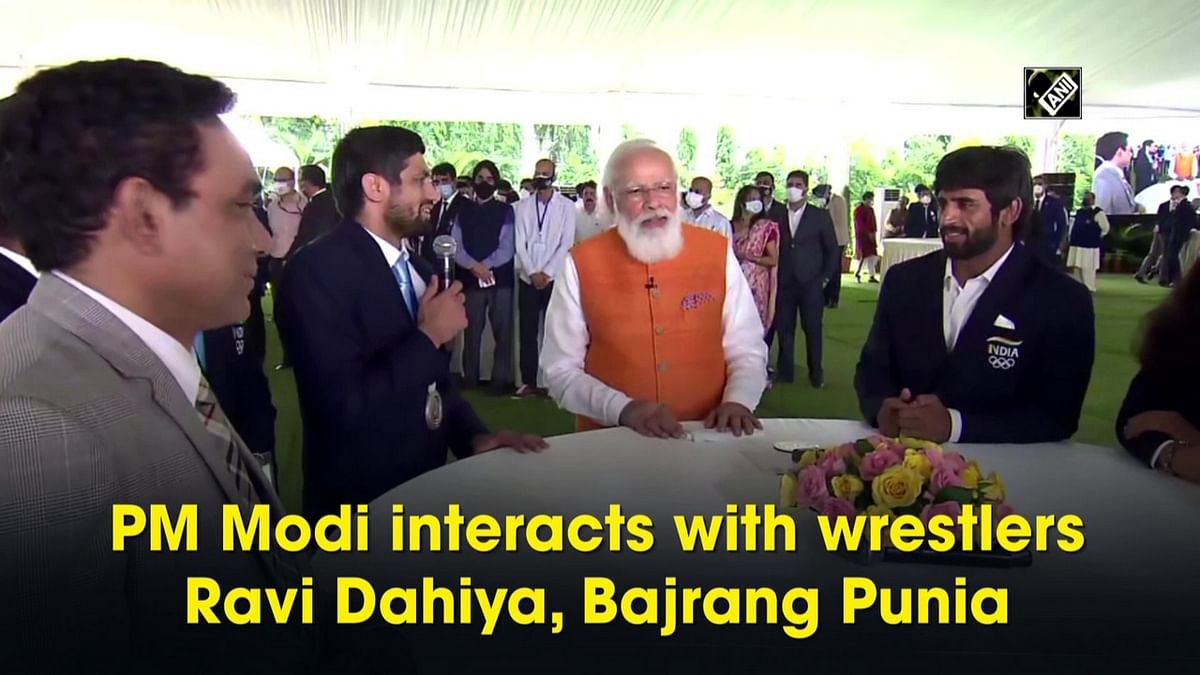 PM Modi interacts with wrestlers Ravi Dahiya, Bajrang Punia