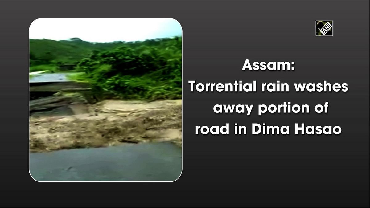 Rain washes away portion of road in Assam