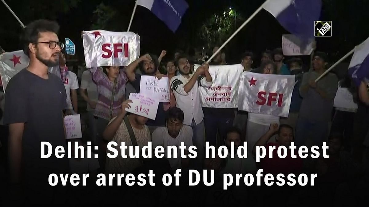 Students in Delhi hold protest over arrest of DU professor