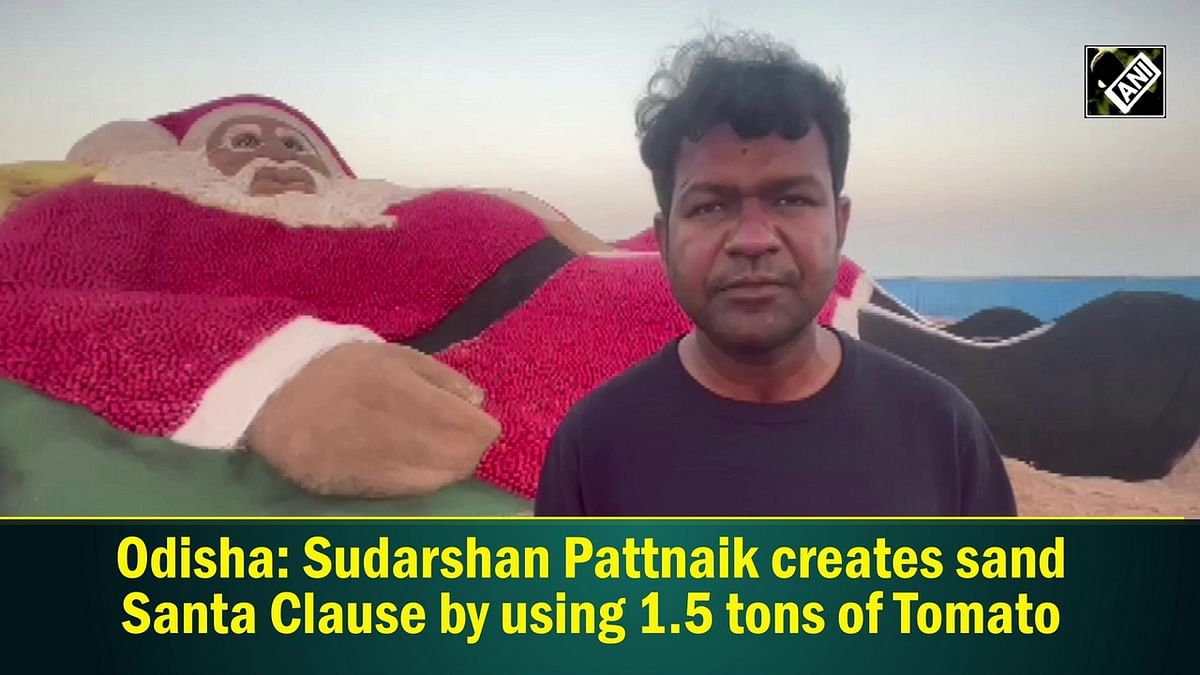 Artist Sudarshan Pattnaik creates Santa Claus with sand, tomatoes