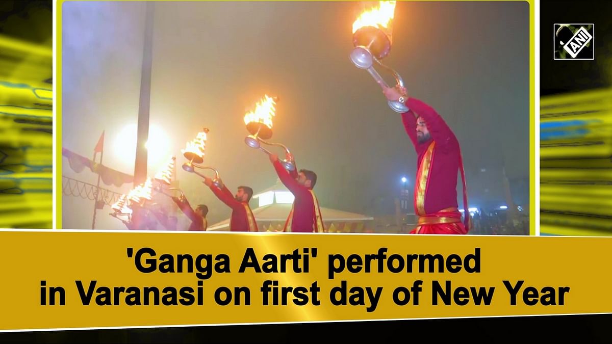 Devotees take part in 'ganga aarti' at Varanasi's Assi ghat