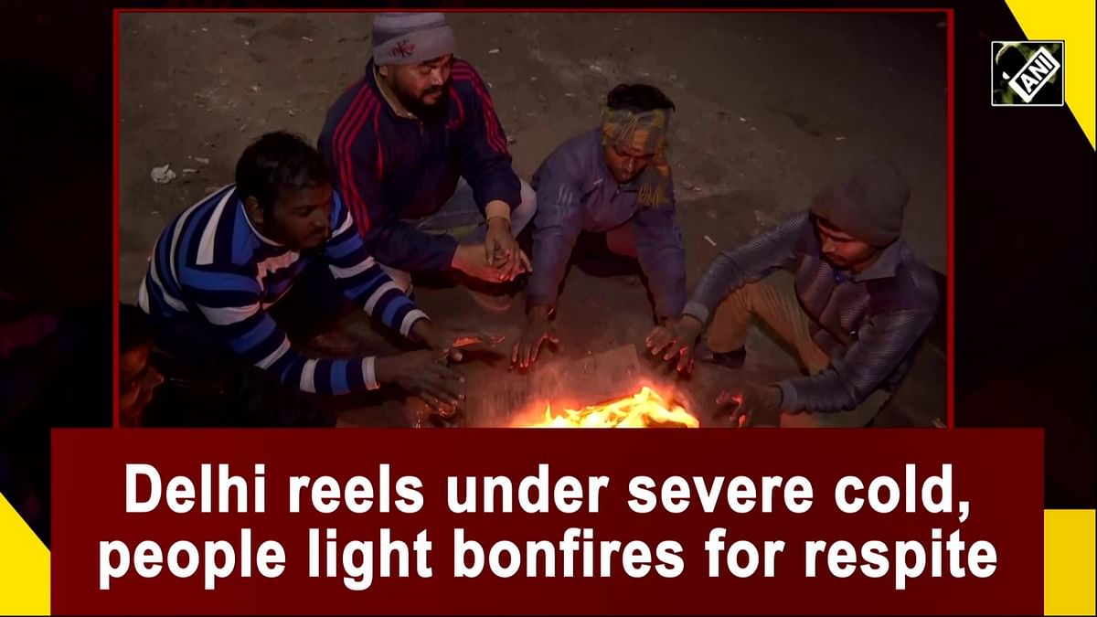 Delhi reels under severe cold, people take to bonfires for respite