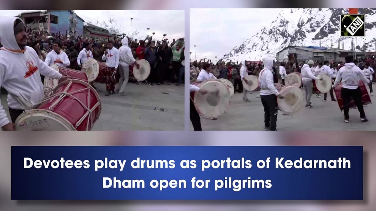 Devotees play drums as Kedarnath Dham open for pilgrims