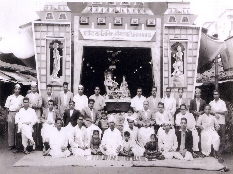 Members of Sarvajanik Ganesh Utsav Mandal, Market in Belagavi posing for a group photograph during the Ganesh festival celebrations in the year 1960.
