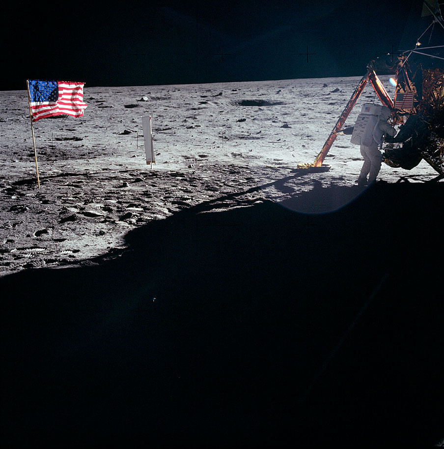 Neil Armstrong works at the LM. (Photo: NASA)