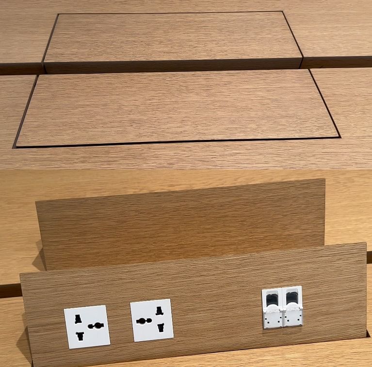 Apple BKC store houses smart tables with smart sensors that respond to hand wave gestures to open up and close charging and ethernet ports. Credit: DH Photo/KVN Rohit