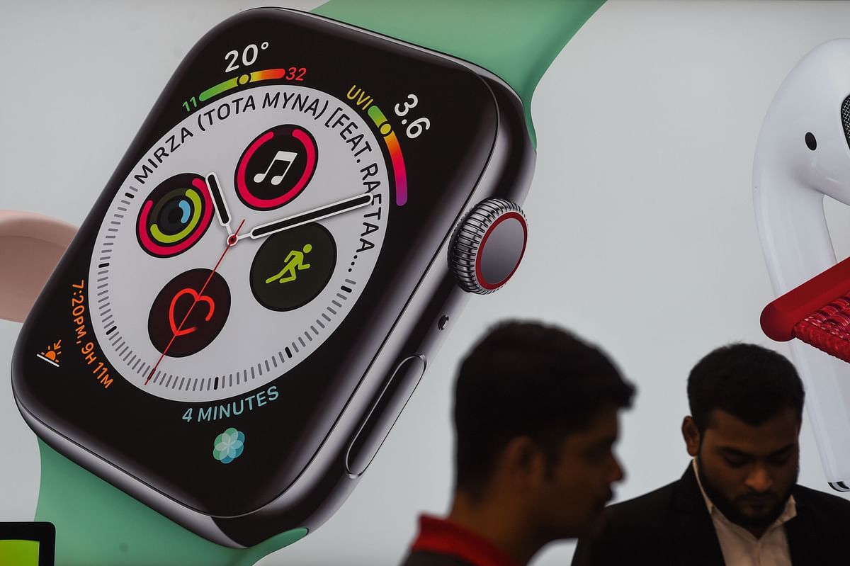 Apple Watch Series 4 poster in the background in a store in Mumbai ( AFP File Photo)