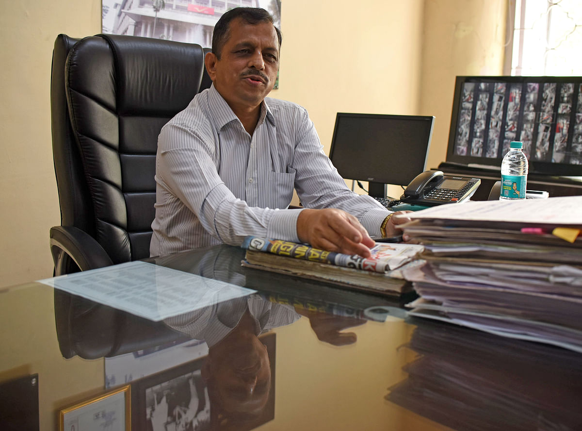 Chief Postmaster Radha Krishna is the man in charge of the 560 people who work at the GPO in Bengaluru. Credit: DH Photo