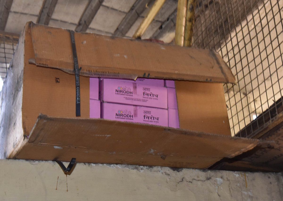 A carton of Nirodh condoms stacked in the toilet in Chamrajpet.