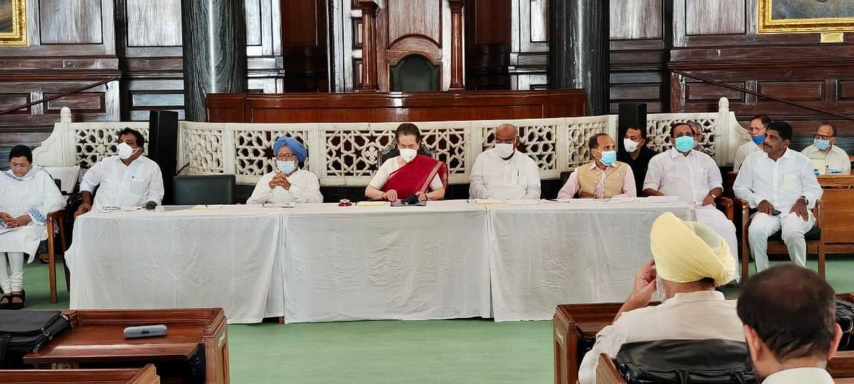 INC interim president Sonia Gandhi with former Prime Minister Dr Manmohan Singh and top Congress leaders Mallikarjun Kharge among others at CCP meet. Credit: Special Arrangements