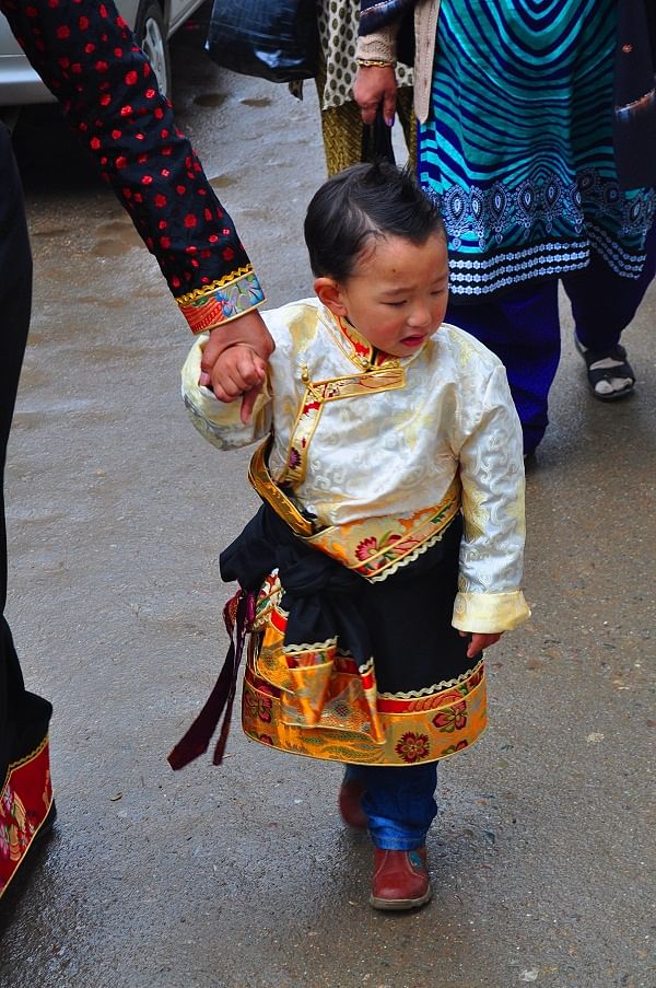 A child in traditional clothes.