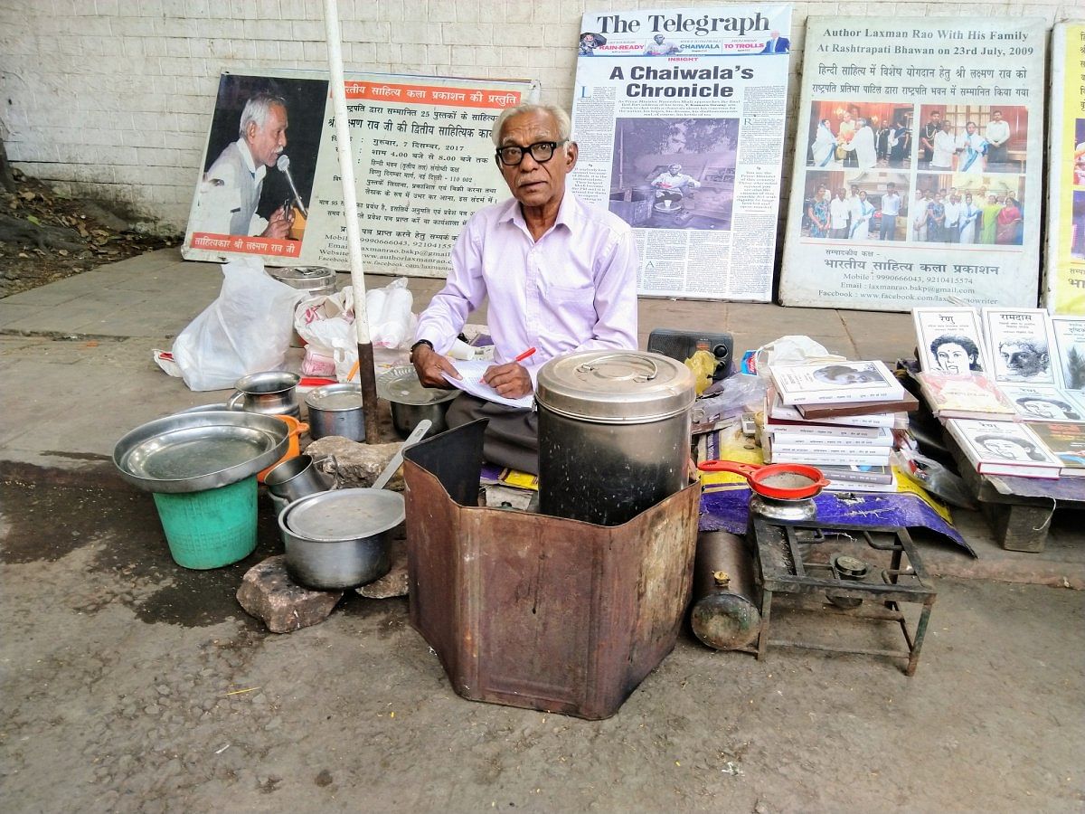 Laxman Rao and his tea stall, where he also writes his novels. He has written 25 novels so far!