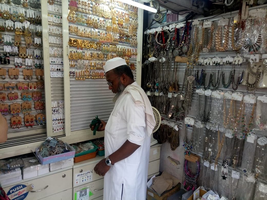 Sameer, shop owner at Commercial Street, says goldplated earrings are selling fast this festive season.