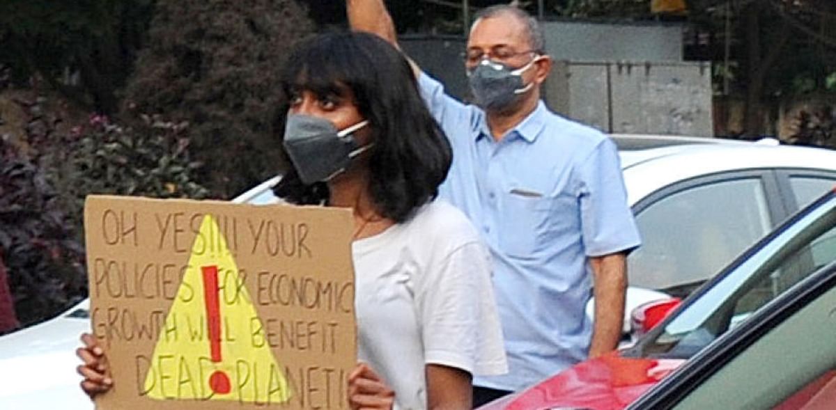 Activist Disha Ravi (grey t-shirt) seen taking part in a World Climate Week protest to spread awareness on the climate change and climate crisis at MG Road in Bengaluru. Credit: DH File Photo/Pushkar V