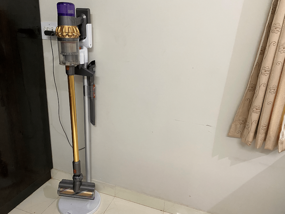 Dyson V11 Absolute Pro Gold series on the docking stand with four accessories. Credit: DH Photo/KVN Rohit