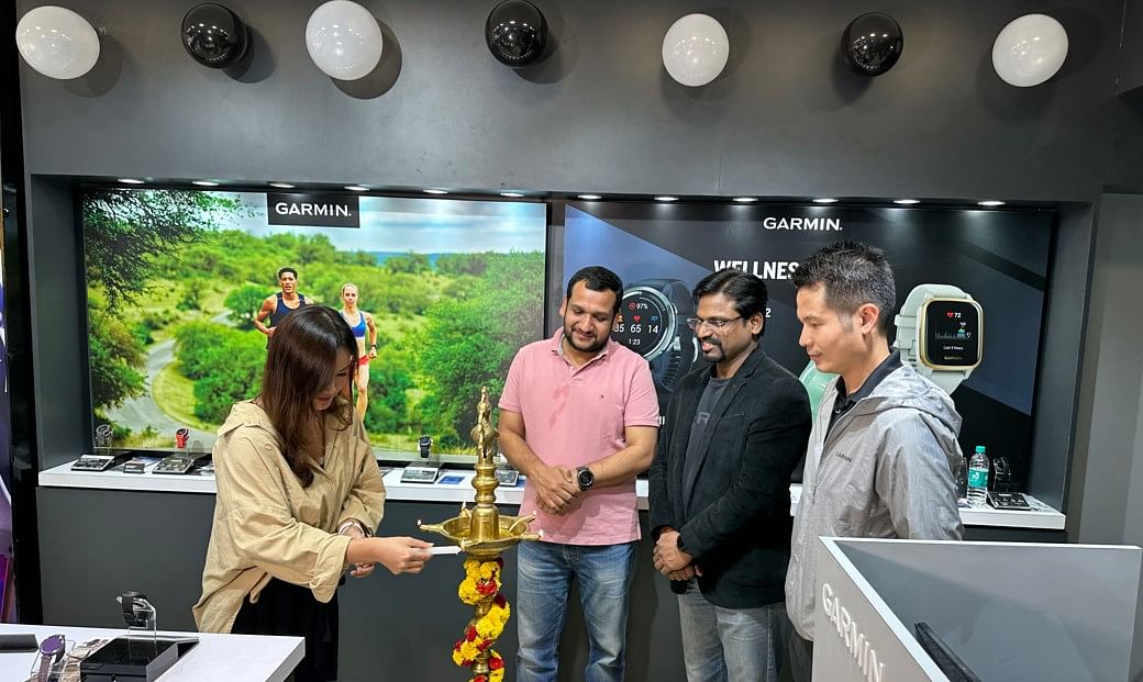 Missy Yang, Head Southeast Asia Marketing, Garmin (lighting the lamp) along with Mr. Sky Chen, Regional Director, Garmin South-East Asia & India, and Mr. Yeshudas Pillai, Country Head, Garmin India. Credit: DH Photo/KVN Rohit