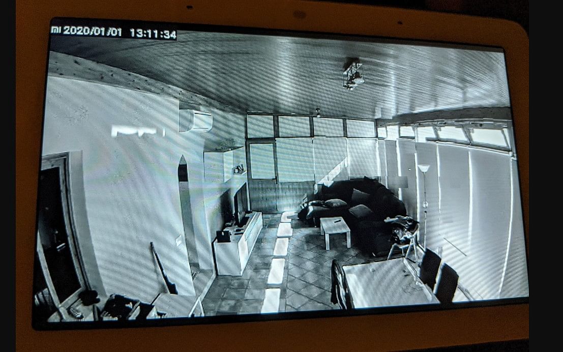 Mi Home camera feed still image showing a living room of someone else's house (Reddit screen-shot)