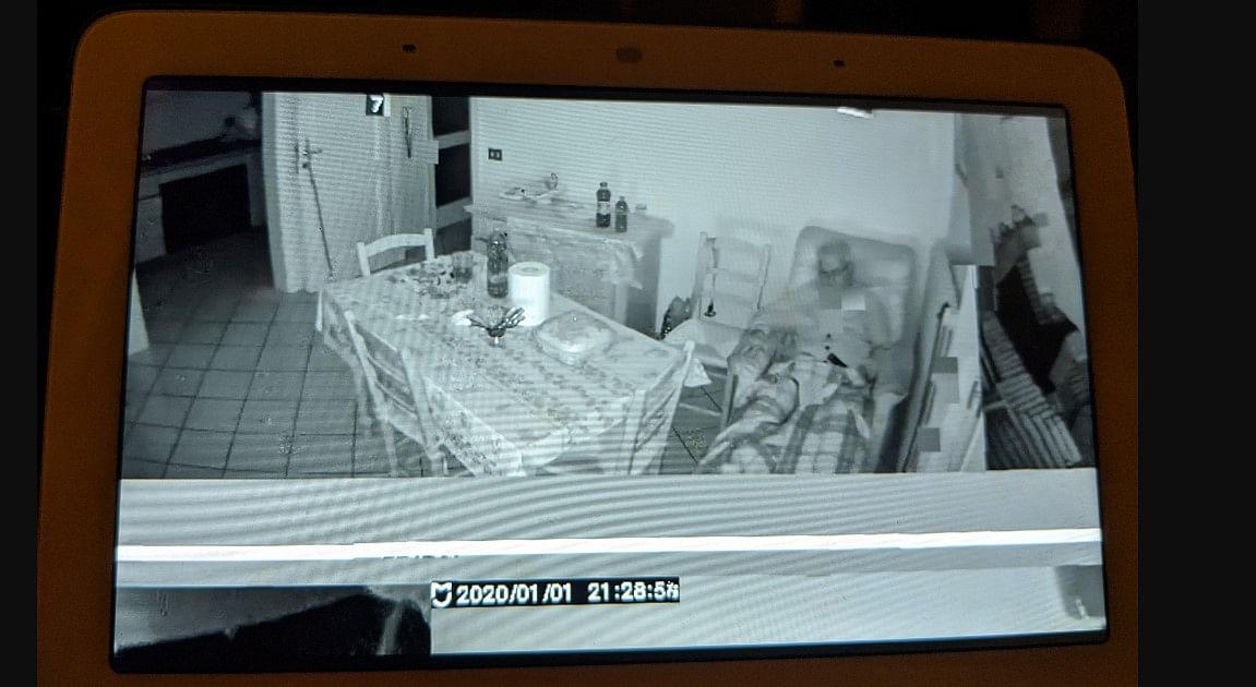 Mi Home camera feed still image showing an old man sleeping on a recliner (Reddit screen-shot)