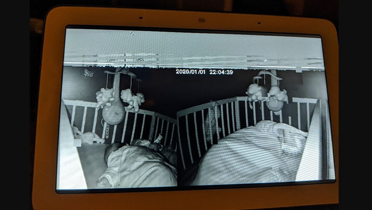 Mi Home camera feed still image showing a baby sleeping in someone else's home (Reddit screen-shot)