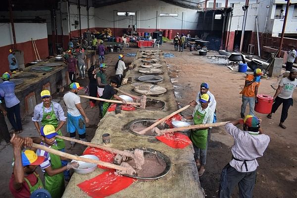 Haleem being pounded at a haleem factory.