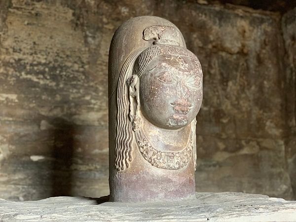 A Shivalinga with the face of a woman in Udayagiri Caves.