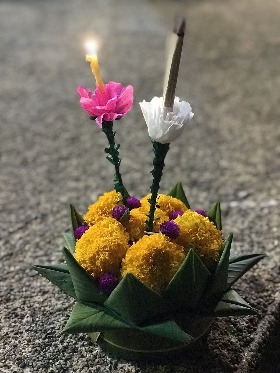 Krathong decorated with flowers,banana leaves and incense.