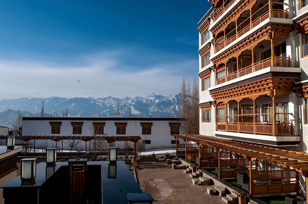 Traditionally carved wooden balconies in The Grand Dragon Ladakh