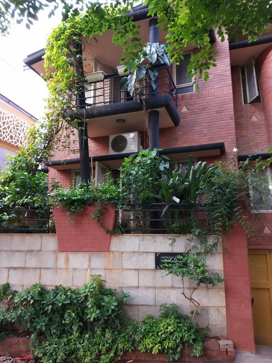 Manjula Subbanna’s 100-year-old house has plentyof green spaces.