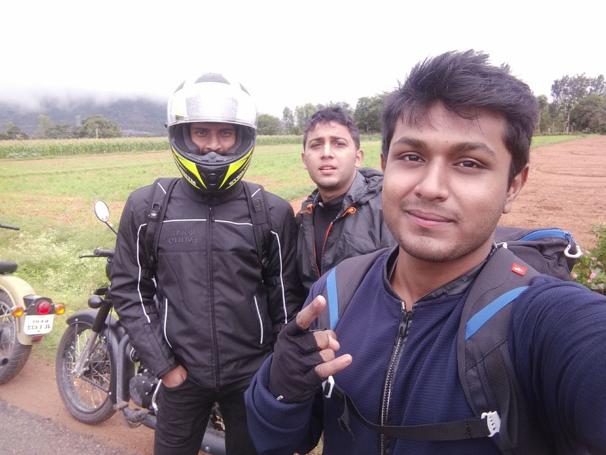 Niranjan, Vignesh Aiyappa and Sukruth S Challaat Ramadevara Betta after a ride in 2019.The photo is a part of their short film