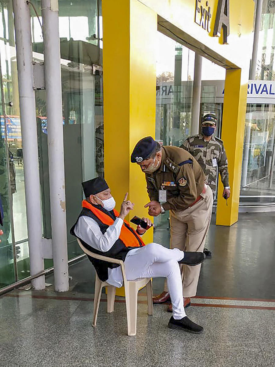 Prahlad Modi, brother of Prime Minister Narendra Modi, stages sit-in at Chaudhary Charan Singh Airport in Lucknow, Wednesday, Feb. 3, 2021. Credit: PTI Photo