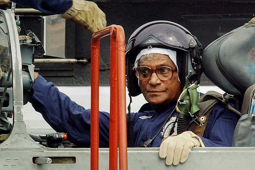 George Fernandes is seen inside the cockpit of a MiG-21 after completing a sortie, at Ambala Air Force Station in 2003. (Image: PTI)