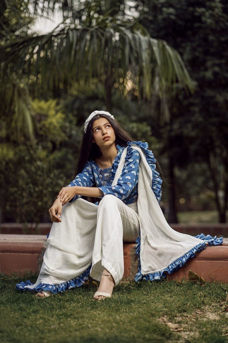 Palazzo pants paired with a sari designed byRishi and Vibhuti.