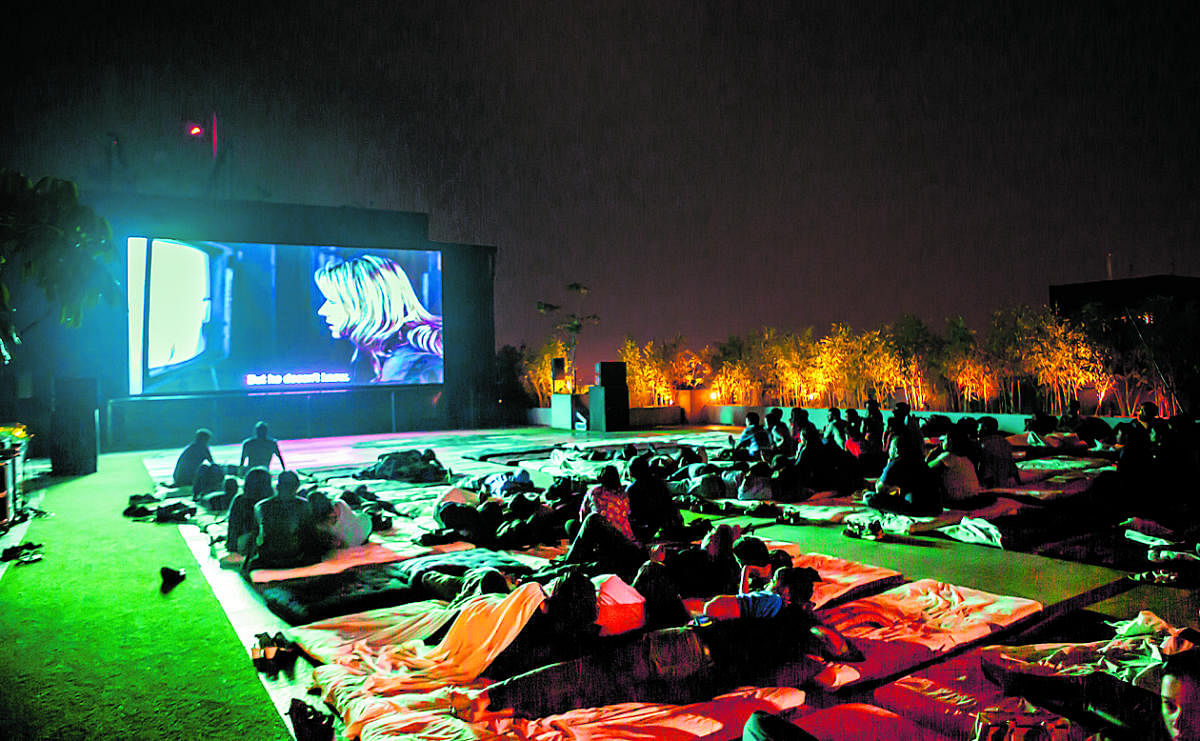A SCC Skycinema screening on a mall rooftop in Whitefield.