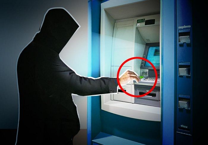 Representational image: Debit card skimming on ATM machine (DH Graphics)