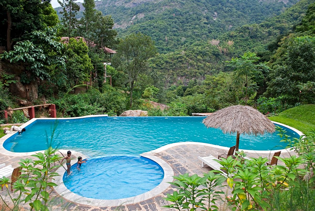 A swimming pool in Kurumba Village Resort, Tamil Nadu