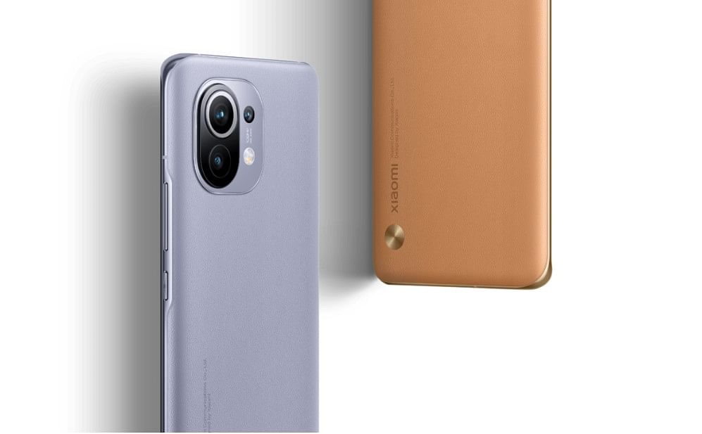 The new Mi 11 comes in two special-- Purple and Honey Beige-- leatherback edition models. Credit: Xiaomi