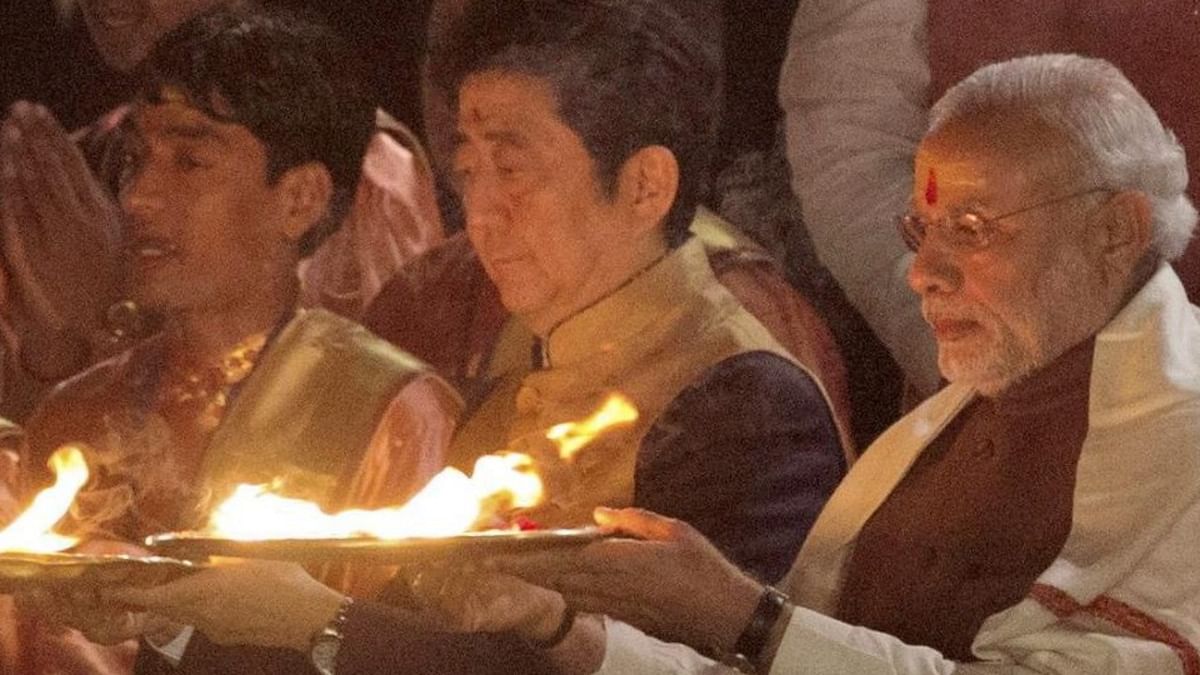 In this Saturday, Dec 12, 2015 file image former Japanese Prime Minister Shinzo Abe and PM Narendra Modi take part in the 'Ganga Arti' in Varanasi, Uttar Pradesh. Credit: PTI Photo