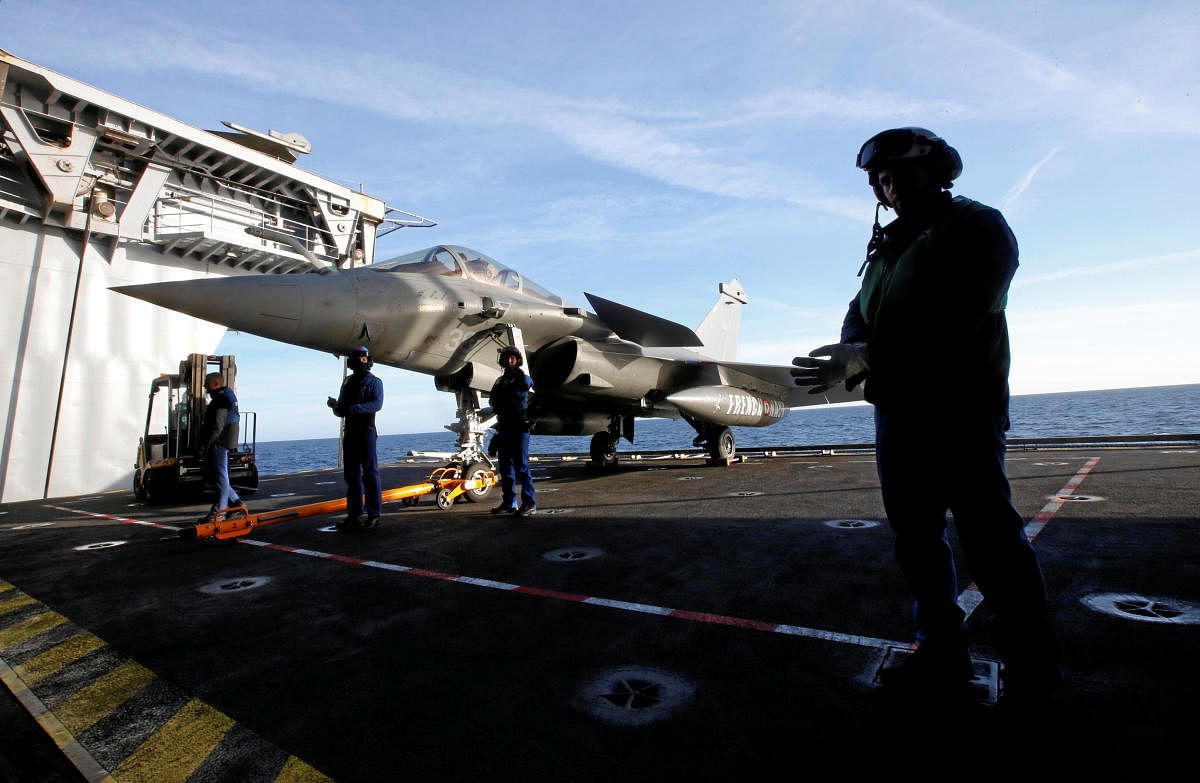 A French Rafale fighter jet is seen aboard the French aircraft carrier Charles de Gaulle in the Mediterranean sea, March 5, 2019. Picture taken March 5, 2019. REUTERS/Jean-Paul Pelissier