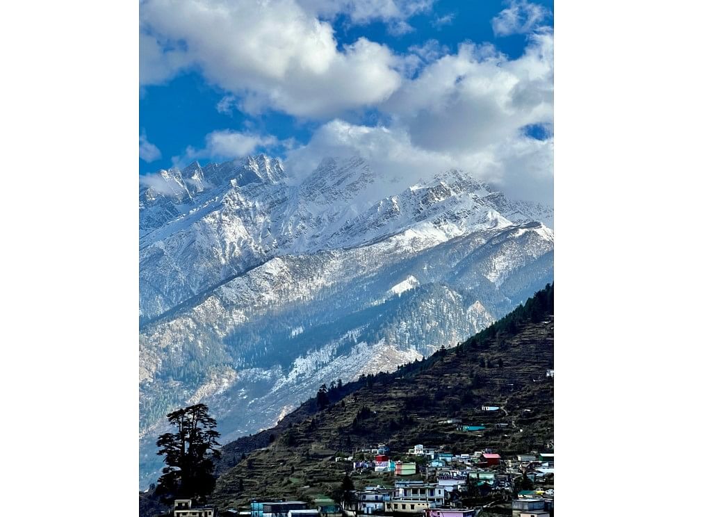 Photo of the snowcapped mountain range, which houses Joshimath in Uttarakhand. captured by Prashanth Vishwanathan. Credit: Apple