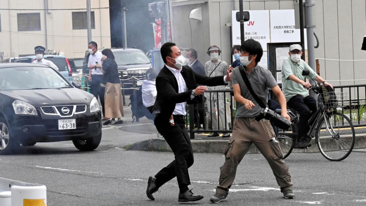 A police officer seizes a man, believed to have shot former Japanese Prime Minister Shinzo Abe, in Nara. Credit: Reuters Photo