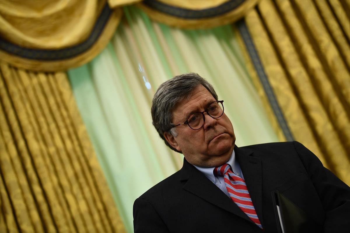 US attorney general Bill Barr blames protest violence on 'far-left extremists'