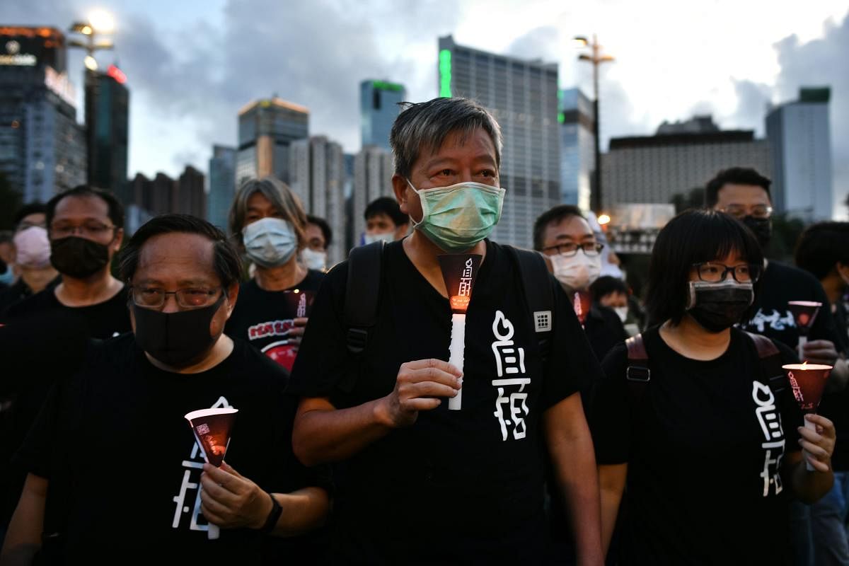 Hong Kong protesters defy Tiananmen vigil ban and enter park