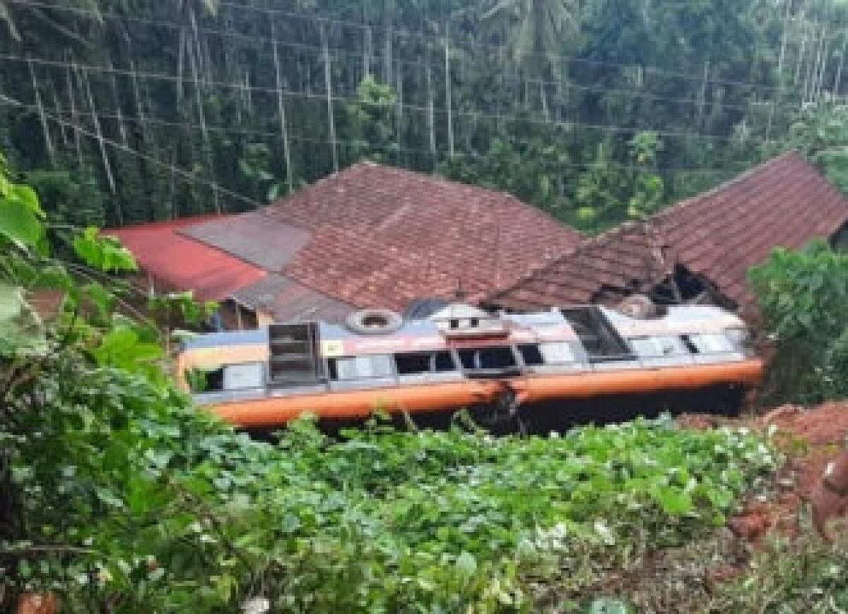 KSRTC bus falls on a house