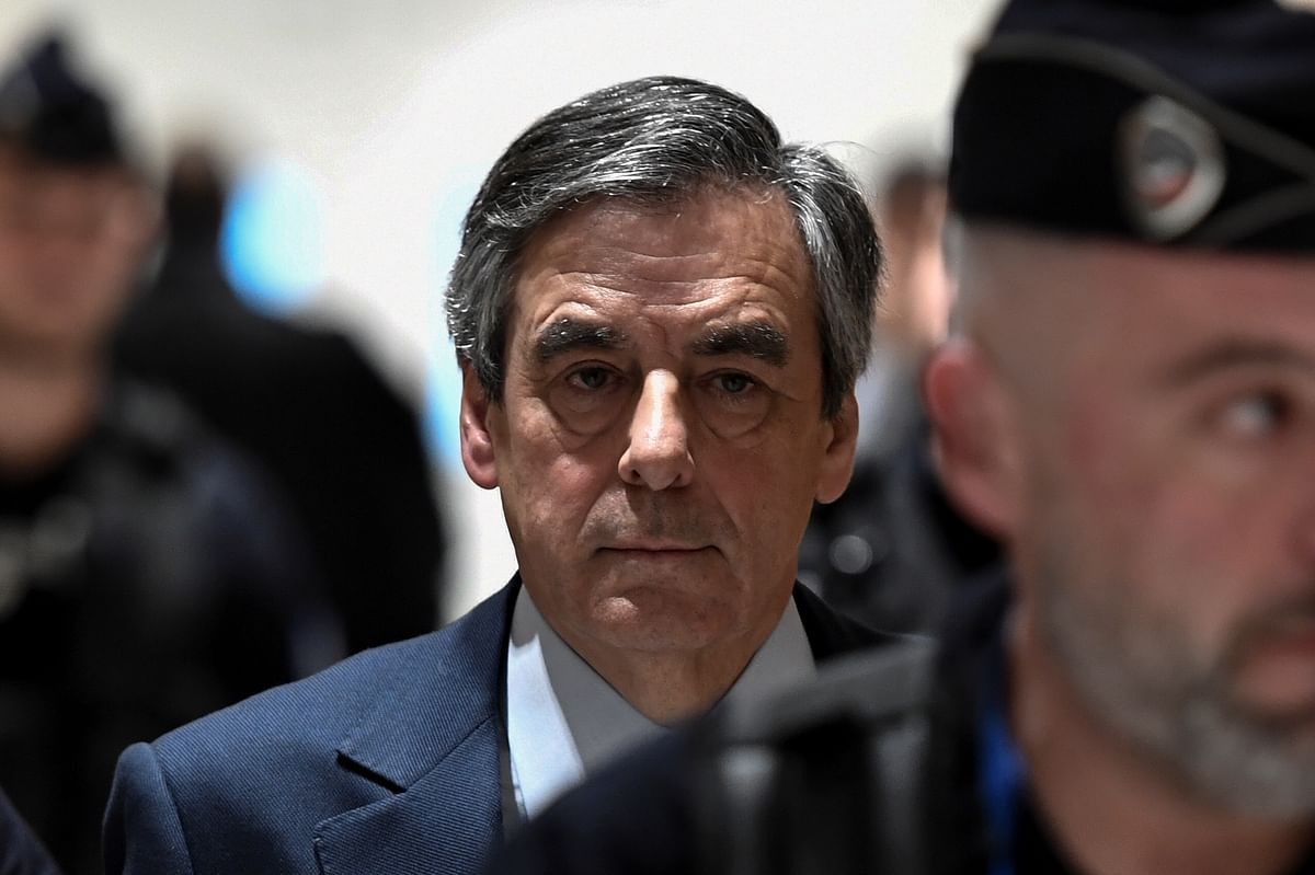 France's Macron seeks review of fraud case against ex-rival Fillon