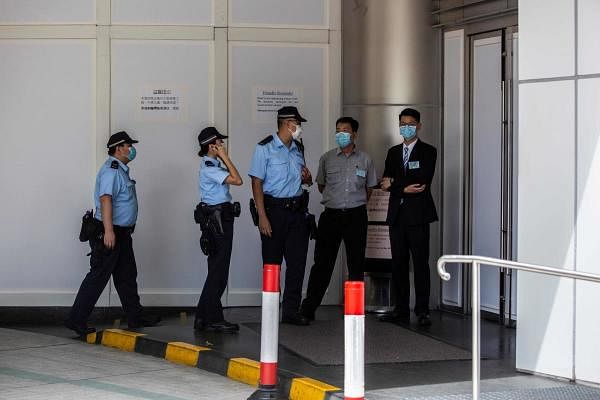 Hong Kong police raid pollster ahead of opposition vote